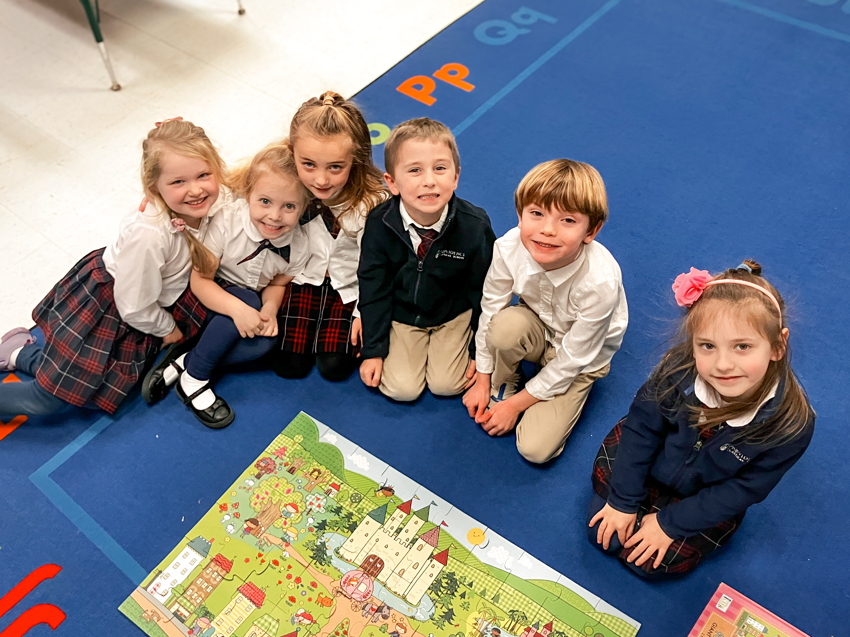 Younger students learning at Providence Classical School